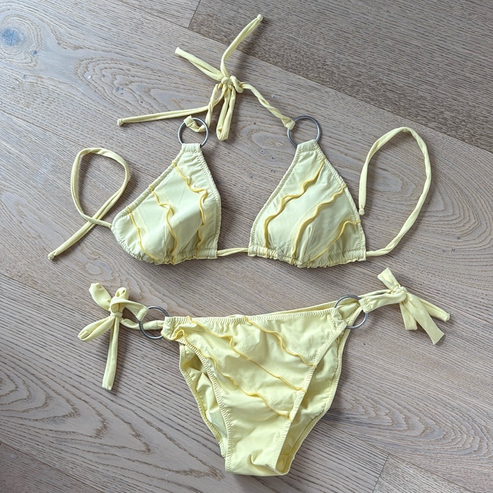 Yellow bikini with ruffles. Barely worn. From Italy
